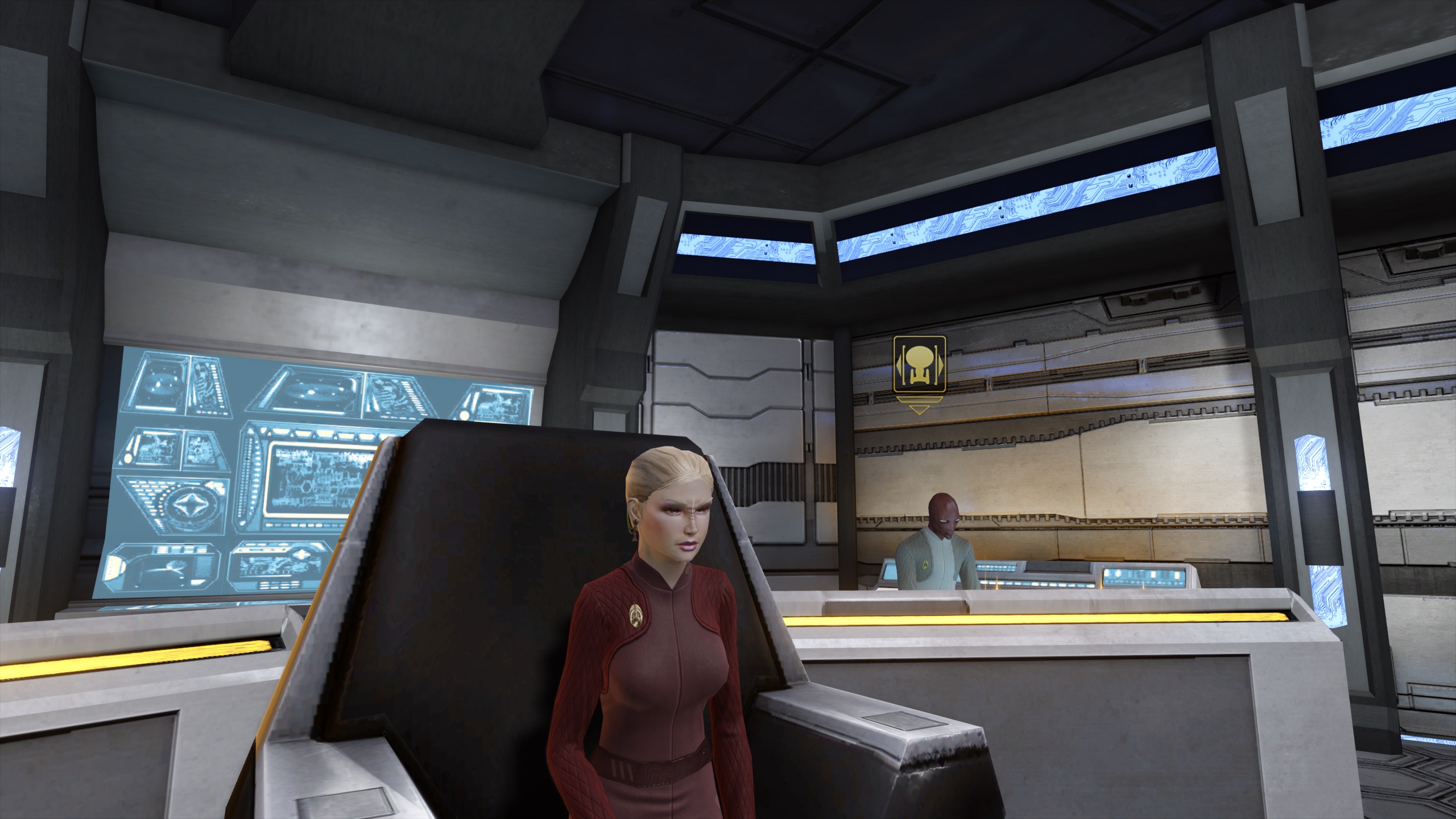 Admiral Gytaik sits in her new Captain's Chair.
